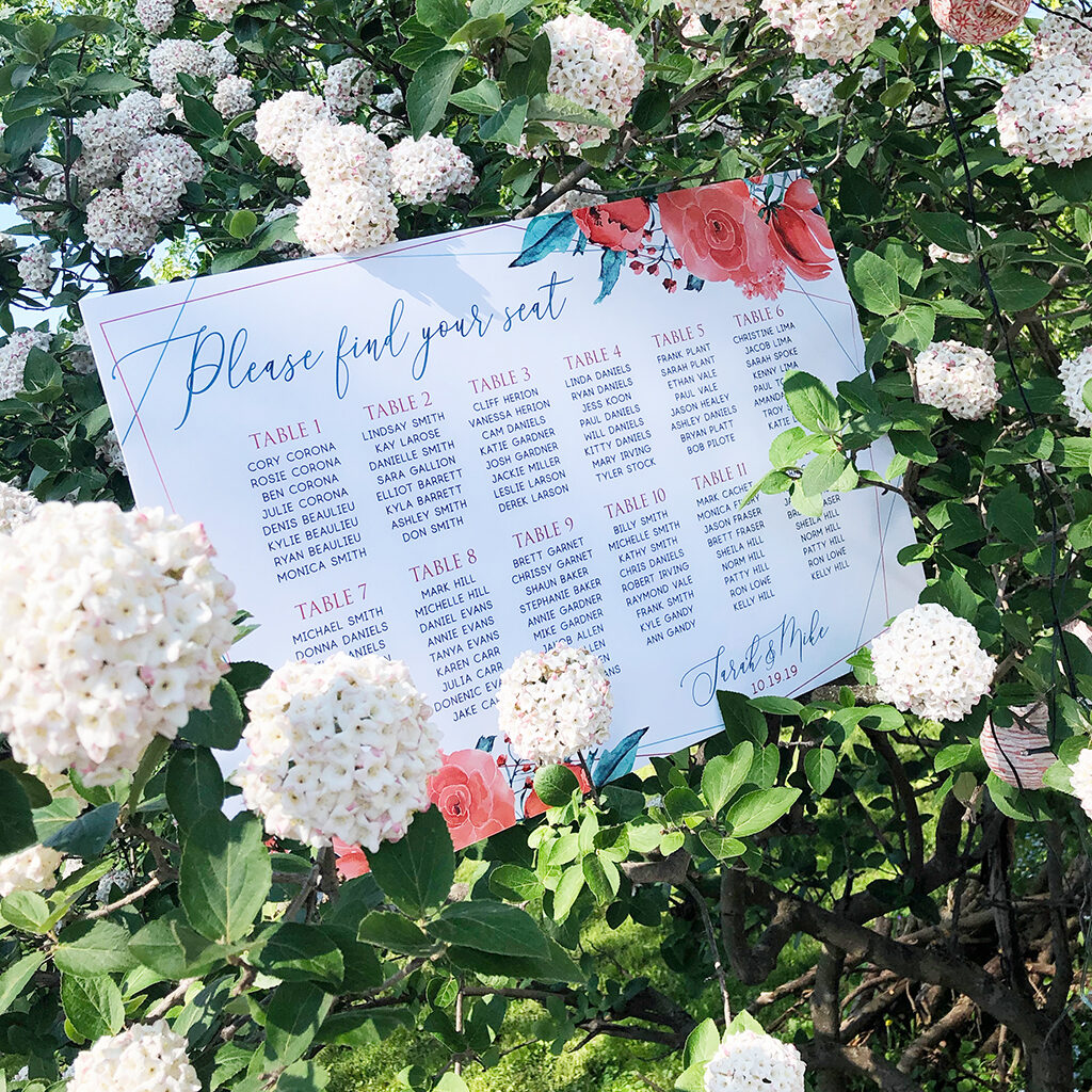 wedding seating chart on a flower bush